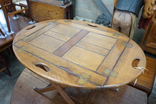 A reproduction George III style mahogany butler's tray on folding stand, width 87cm, depth 64cm, height 55cm
